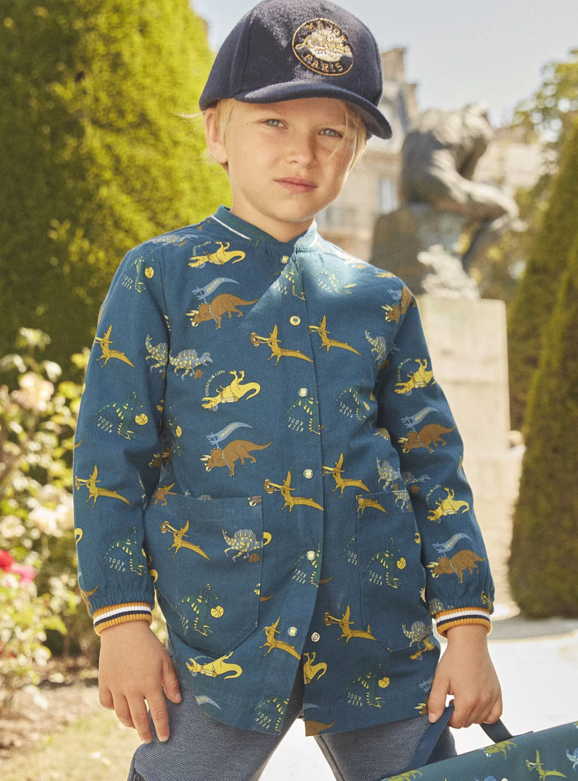 Shop Sergent Major Blouse scolaire bleu pétrole à imprimé dinosaures